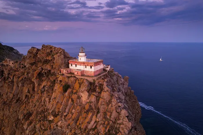 Framed Print : The Ponza's lighthouse on top of a volcanic cliff and surrounded by the sea at dusk, Ponza island, Pontine archipelago, Latium region, Italy Framed Print : The Ponza's lighthouse on top of a volcanic cliff and surrounded by the sea at dusk, Ponza island, Pontine archipelago, Latium region, Italy