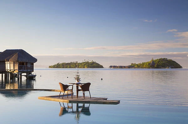 Pool of Sofitel Hotel with Sofitel Private Island in background, Bora Bora, Society