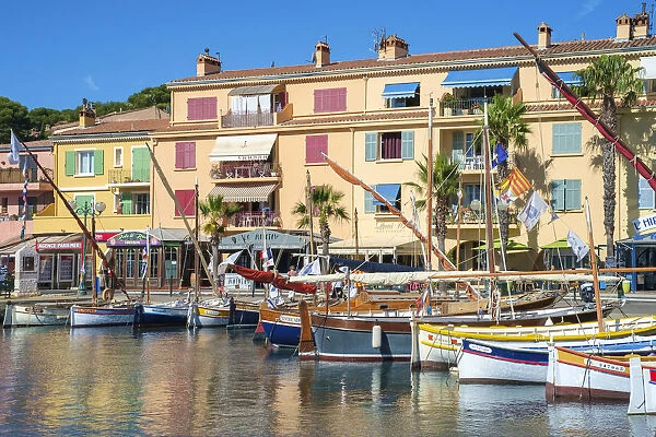 Port harbor filled with traditional wooden fishing boats at Sanary-sur-Mer, Var department