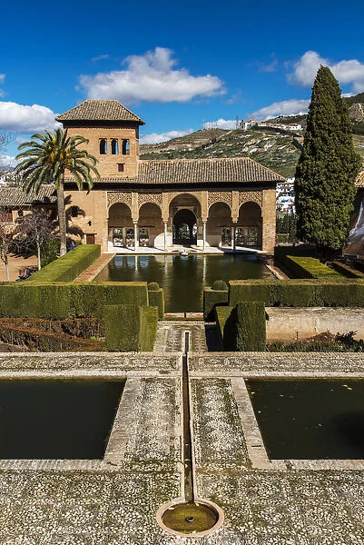 Portico and pool of the early 14th-century Palacio del Partal, Alhambra palace, Granada