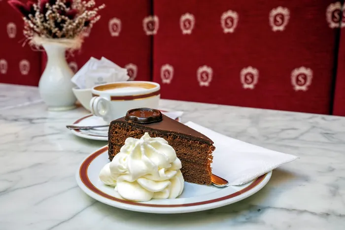 Framed Print : Portion of Sachertorte chocolate cake with whipped cream served at Cafe Sacher, Graz, Styria, Austria Framed Print : Portion of Sachertorte chocolate cake with whipped cream served at Cafe Sacher, Graz, Styria, Austria