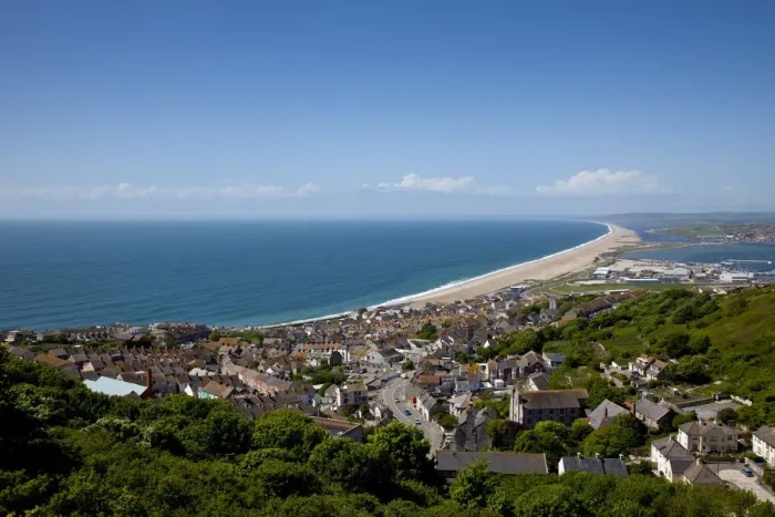 Framed Print : Portland, Dorset, England, Chesil beach and the town of Fortuneswell from portland