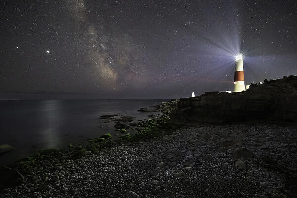 Portland Bill Lighthouse at night with the Milky Way, Isle of Portland