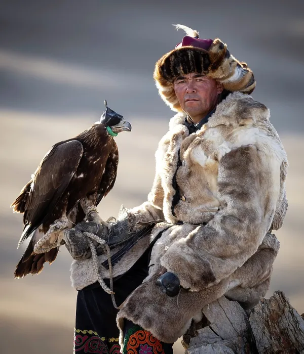 Framed Print : Portrait of a Kazakh Eagle Hunter wearing traditional fur clothing and posing with his trained golden eagle, Bayan-Ulgii Province, Western Mongolia, Asia Framed Print : Portrait of a Kazakh Eagle Hunter wearing traditional fur clothing and posing with his trained golden eagle, Bayan-Ulgii Province, Western Mongolia, Asia