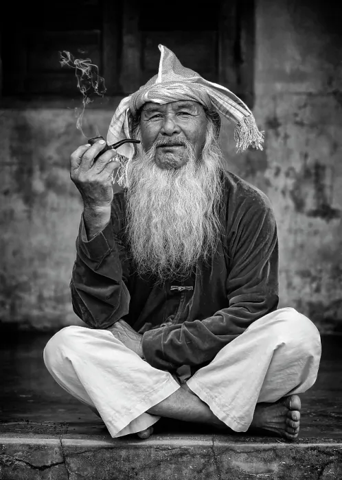Framed Print : Portrait of an old man wearing conical hat and smoking a pipe, Phuoc Dan Village, Ninh Thuan Province, Vietnam Framed Print : Portrait of an old man wearing conical hat and smoking a pipe, Phuoc Dan Village, Ninh Thuan Province, Vietnam
