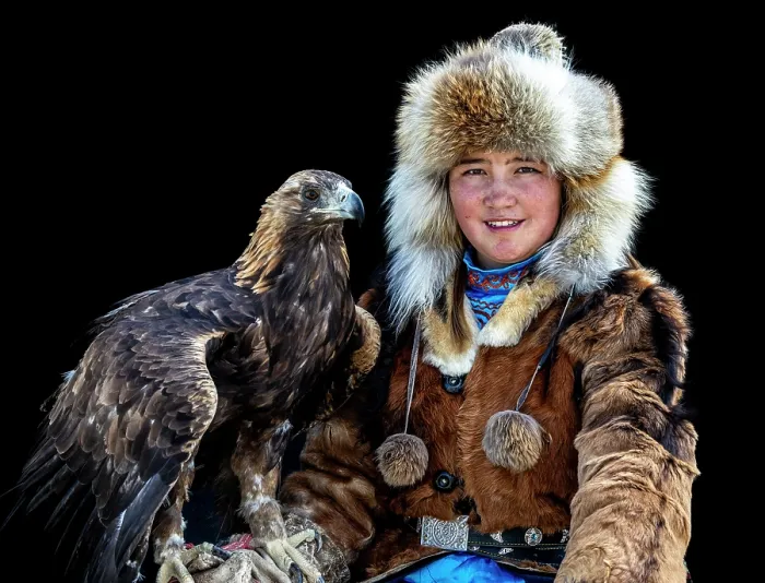Framed Print : Portrait of a young female Kazakh Eagle Hunter posing with her trained golden eagle, Bayan-Ulgii Province, Western Mongolia, Asia Framed Print : Portrait of a young female Kazakh Eagle Hunter posing with her trained golden eagle, Bayan-Ulgii Province, Western Mongolia, Asia