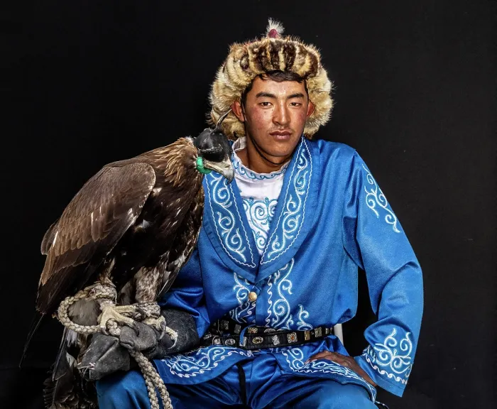 Framed Print : Portrait of a young Kazakh Eagle Hunter posing with his trained golden eagle, Bayan-Ulgii Province, Western Mongolia, Asia Framed Print : Portrait of a young Kazakh Eagle Hunter posing with his trained golden eagle, Bayan-Ulgii Province, Western Mongolia, Asia