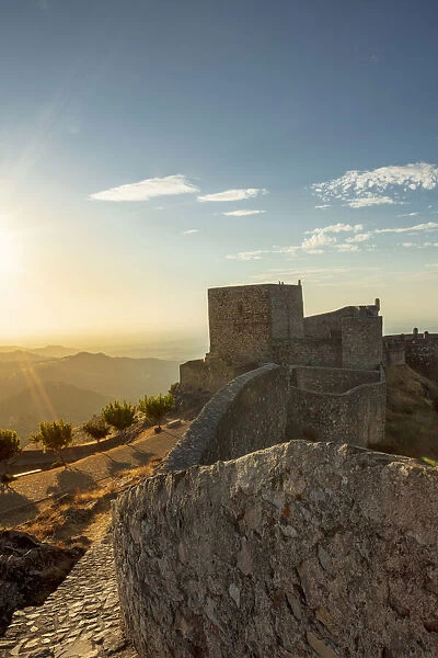 Portugal, Alentejo, Marvao. Sunset seen over the walls of the ancient Moorish & medieval