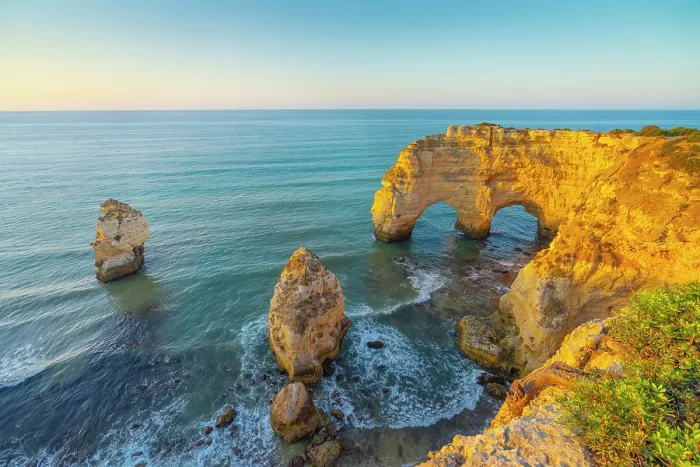 Framed Print : Portugal, Algarve, Caramujeira, Praia de Marinha, double sea arch and coastal rock formations Framed Print : Portugal, Algarve, Caramujeira, Praia de Marinha, double sea arch and coastal rock formations