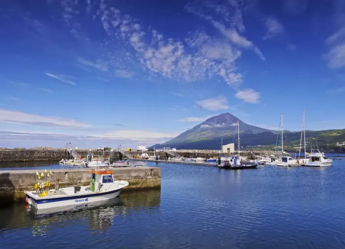 Framed Print : Portugal, Azores, Pico, Lajes do Pico, View of the port with Pico Mountain in