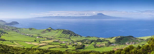 Portugal, Azores, Sao Jorge Island, Pico da Velha of fields and Pico Volcano