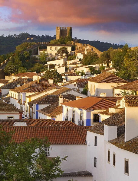 Portugal, Estramadura, Obidos, overview of 12th century town at dusk