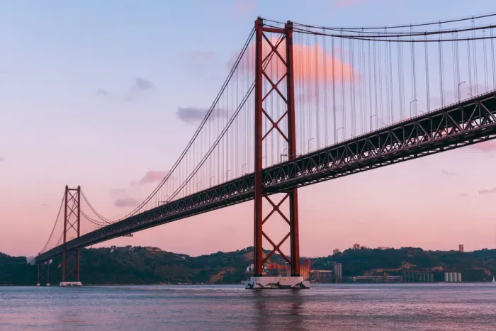 Framed Print : Portugal, Lisbon. The 25 de Abril Bridge across the Tagus river and Cristo Rei (Christ Framed Print : Portugal, Lisbon. The 25 de Abril Bridge across the Tagus river and Cristo Rei (Christ