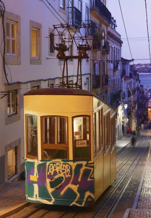 Framed Print : Portugal, Lisbon, Alfama district, Tram at dusk Framed Print : Portugal, Lisbon, Alfama district, Tram at dusk