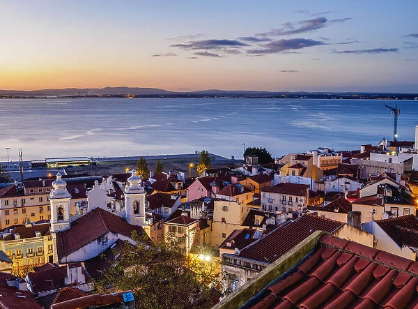 Portugal, Lisbon, Miradouro das Portas do Sol, Twilight view over Alfama Neighbourhood