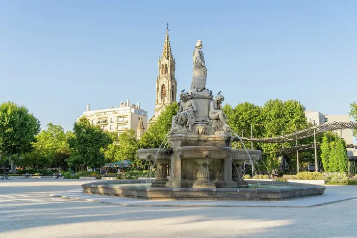 Framed Print : Pradier Fountain and the Church of Sainte Perprtue in the background, Nimes, Gard, France
