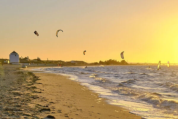 Praia dos Moinhos (Beach of the Windmills) and Tagus river with kite surfers. Alcochete, Portugal