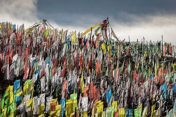 Prayer flags on hillside, Songpan, China