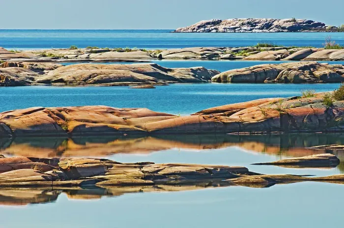Framed Print : pre-cambrian shield at Desjardins Bay South of Philip Edward Island near Killarney, Ontario, Canada Framed Print : pre-cambrian shield at Desjardins Bay South of Philip Edward Island near Killarney, Ontario, Canada