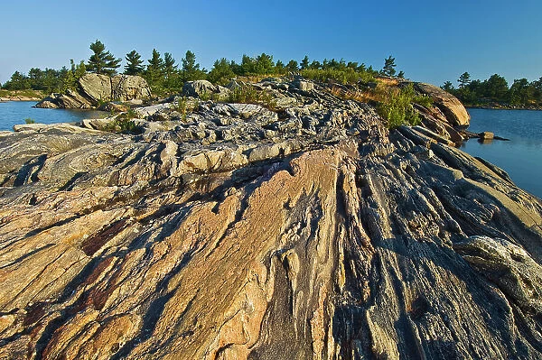 Precambrian shield rock on Georgian Bay (Lake Huron) Snug Harbour, Ontario, Canada