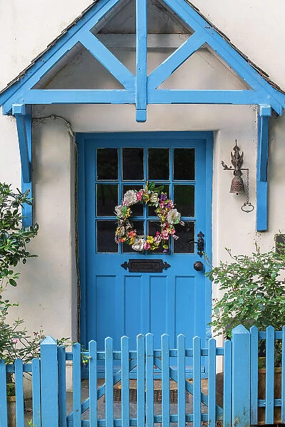 Pretty Cornish cottage front door in the village of Altarnun, Cornwall, England. Autumn (September) 2022