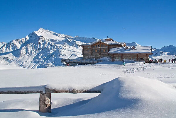 Pristine snow at Sunny Valley mountain hut. Valtellina, Lombardy, Italy