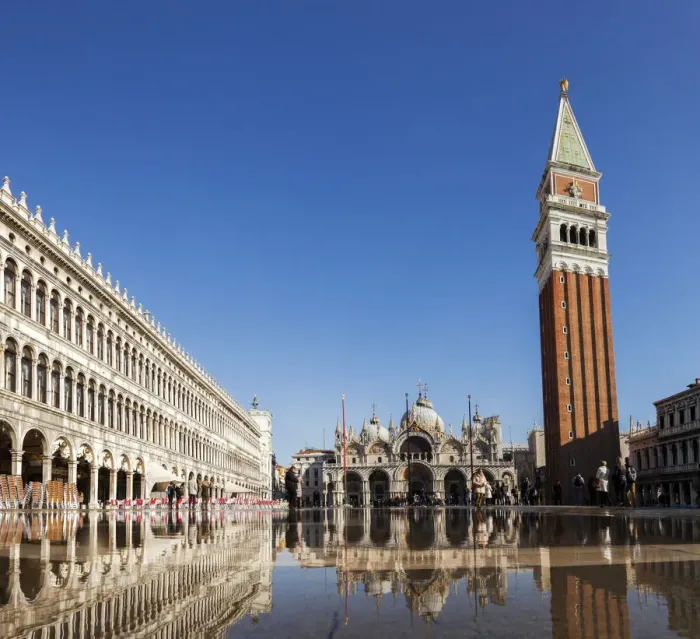 Framed Print : Procuratie Vecchie, the Basilica San Marco and the Campanille reflected in the high Water
