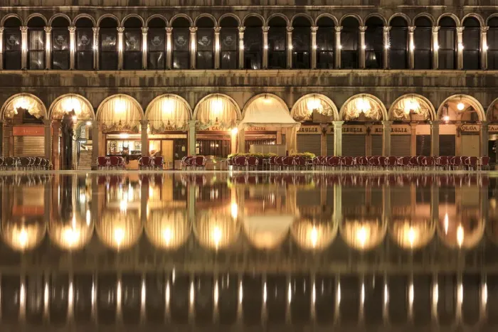 Framed Print : Procuratie Vecchie, the Caffa Quadri reflected in the high Water (Acqua alta) of St Framed Print : Procuratie Vecchie, the Caffa Quadri reflected in the high Water (Acqua alta) of St