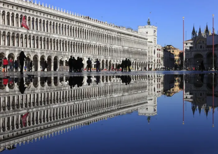 Framed Print : Procuratie Vecchie and Clocktower are Reflected in the High Water (Acqua alta) of St Framed Print : Procuratie Vecchie and Clocktower are Reflected in the High Water (Acqua alta) of St