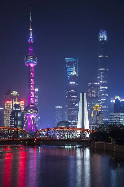 Pudong skyline across the Suzhou Creek and Waibaidu bridge, Shanghai, China