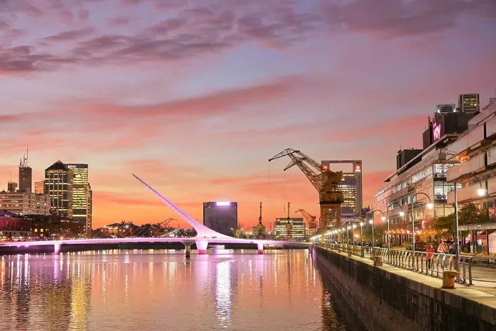 Framed Print : The Puente de la Mujer bridge illuminated at twilight, Puerto Madero, Buenos Aires, Argentina