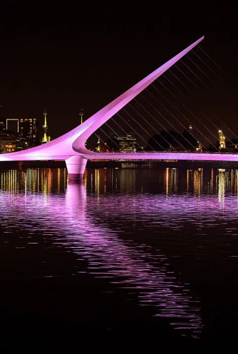Framed Print : The Puente de la Mujer bridge at night, Puerto Madero, Buenos Aires, Argentina. It was designed by architect Santiago Calatrava Framed Print : The Puente de la Mujer bridge at night, Puerto Madero, Buenos Aires, Argentina. It was designed by architect Santiago Calatrava