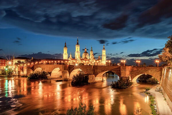 Puente de Piedra and Cathedral-Basilica of Our Lady of the Pillar along Ebro River, Zaragoza, Aragon, Spain