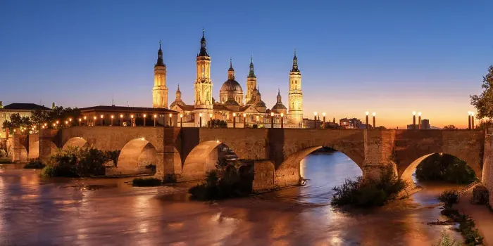 Framed Print : Puente de Piedra and Cathedral-Basilica of Our Lady of the Pillar along Ebro River at Sunset, Zaragoza, Aragon, Spain Framed Print : Puente de Piedra and Cathedral-Basilica of Our Lady of the Pillar along Ebro River at Sunset, Zaragoza, Aragon, Spain
