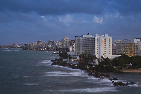 Puerto Rico, San Juan, elevated view of Condado hotels, evening