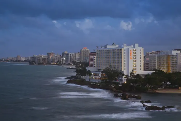 Framed Print : Puerto Rico, San Juan, elevated view of Condado hotels, evening Framed Print : Puerto Rico, San Juan, elevated view of Condado hotels, evening