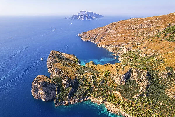 Punta Campanella and Amalfi coast with Capri island in the background, Punta Campanella, Ieranto bay, Nerano, Amalfi coast, Naples province, Campania, Italy