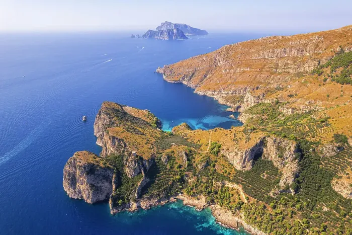 Framed Print : Punta Campanella and Amalfi coast with Capri island in the background, Punta Campanella, Ieranto bay, Nerano, Amalfi coast, Naples province, Campania, Italy