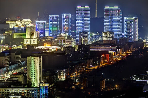Pyongyang, new modern buildings in the centre of Pyongyang colourfully illuminated