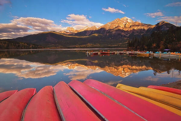 Pyramid Mountain and canoes on Pyramid Lake, Jasper National Park, Alberta, Canada