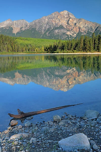 Pyramid Mountain reflected in Patricia Lake and the Canadian Rocky Mountains, Jasper National Park, Alberta, Canada