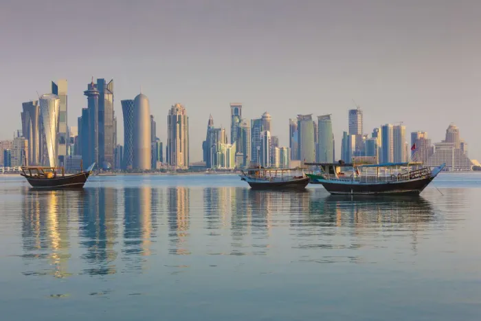 Framed Print : Qatar, Doha, Dhows on Doha Bay with West Bay skyscrapers, dawn