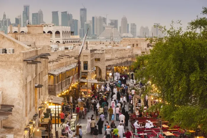 Framed Print : Qatar, Doha, Souq Waqif, redeveloped bazaar area, elevated view with West Bay skyscrapers Framed Print : Qatar, Doha, Souq Waqif, redeveloped bazaar area, elevated view with West Bay skyscrapers