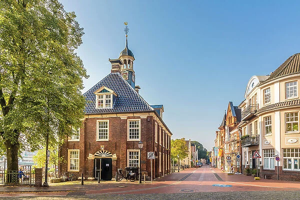 Quayside street with old harbor building, Leer, East Frisia, Lower Saxony, Germany