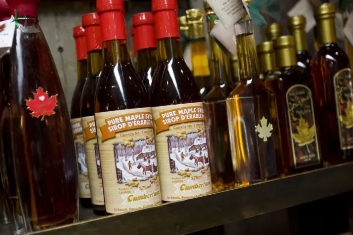Framed Print : Quebec City, Canada. Canadian maple syrup on the shelf in old Quebec City Canada