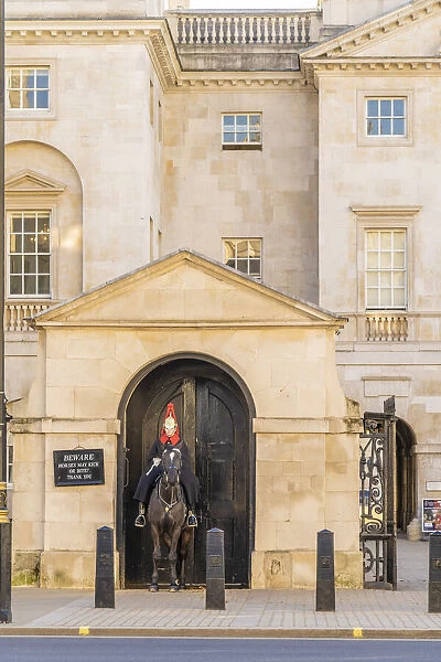 Queens Guardsman on a horse in Whitehall, London, England, Uk