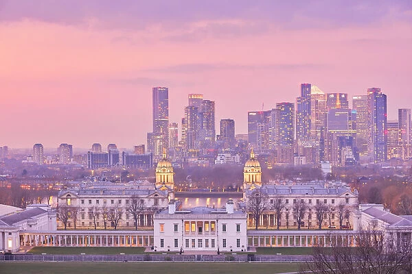 The Queens House, National Maritime Museum, and the Old Royal Naval College with the Canary Wharf skyline at twilight, Greenwich, London, United Kingdom, Northern Europe