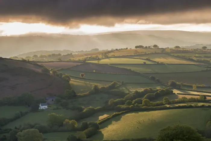 Framed Print : Quintatown farm surrounded by beautiful rolling countryside, Chagford, Dartmoor National Framed Print : Quintatown farm surrounded by beautiful rolling countryside, Chagford, Dartmoor National