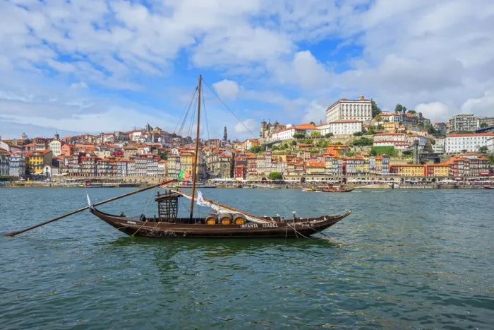 Framed Print : Rabelo boats in Porto with river Douro and bishops palace, Ribeira, Portugal Framed Print : Rabelo boats in Porto with river Douro and bishops palace, Ribeira, Portugal