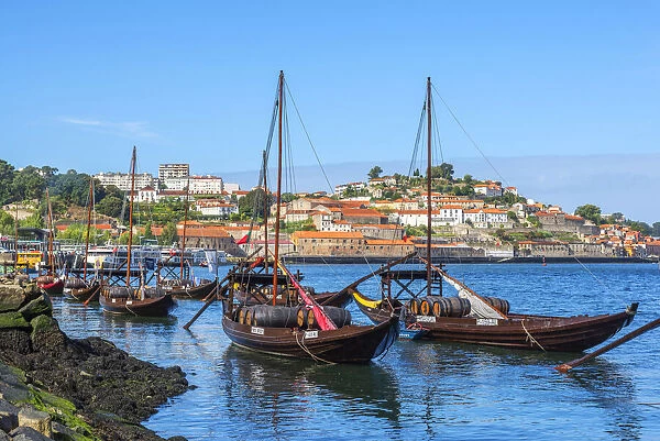 Rabelo boats with river Douro and Ribeira, Porto, Portugal